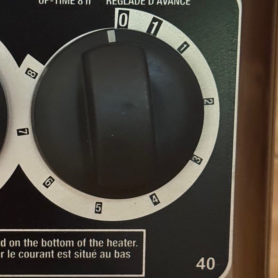Close-up of the sauna's right-hand timer dial